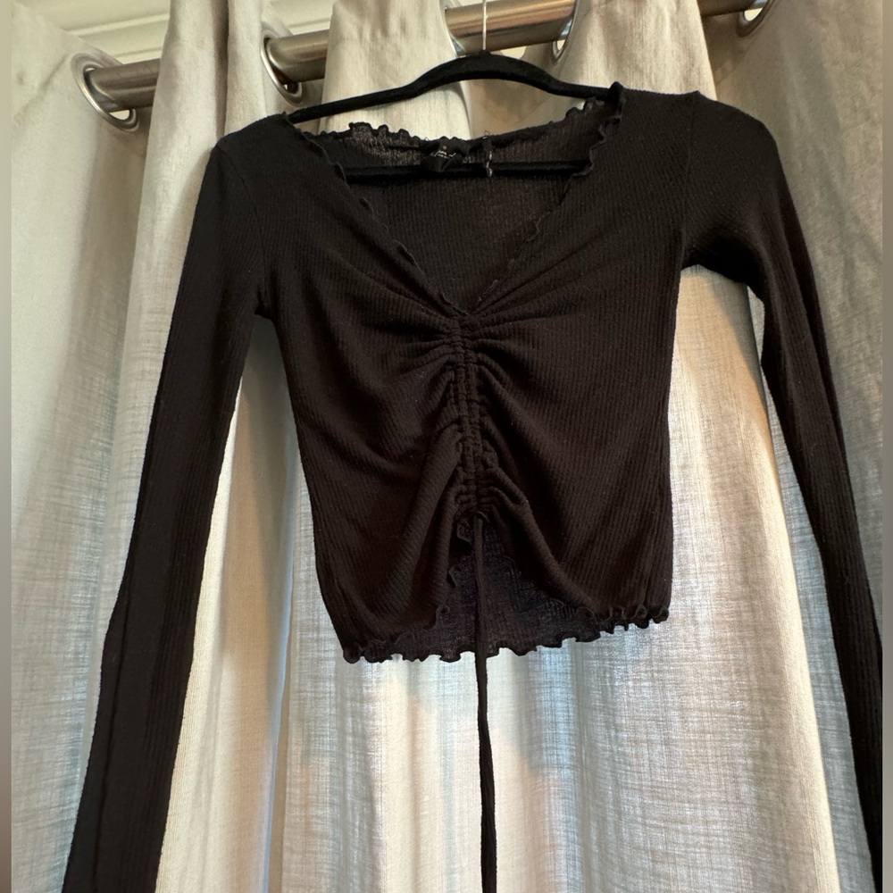 Black going out top